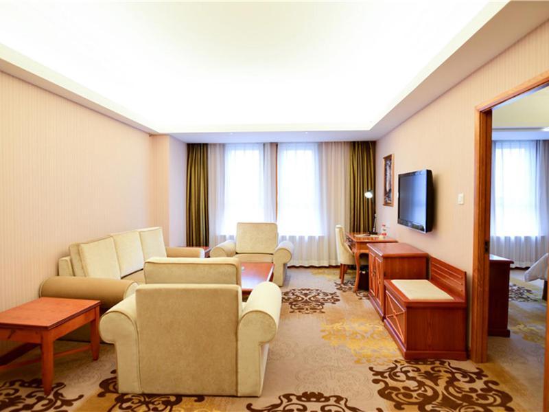 Vienna Hotel Xinjiang Yining Shanghai City Exterior photo